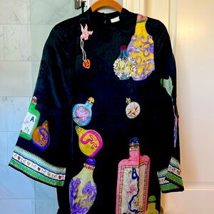New never worn Alemais dress
 Runs large 
Black dress with large bottle prints